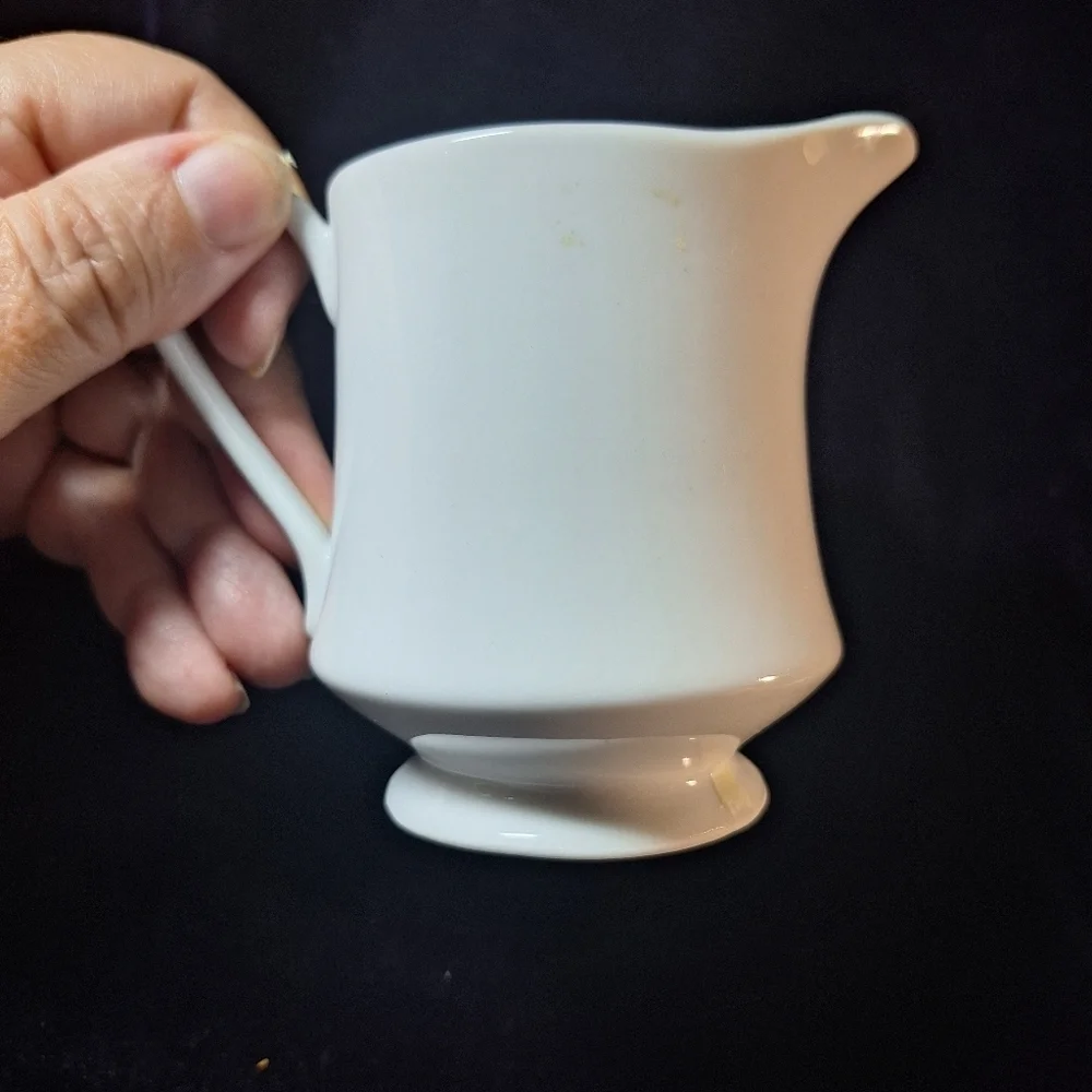 White porcelain creamer